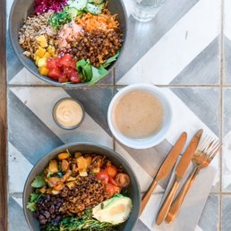 Plant Poke Bowl (top), and custom bowl (bottom) with coconut peanut sauce on the side. So good!
