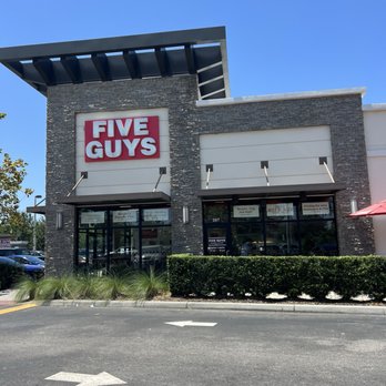 Five Guys - the front of a five guys restaurant - Hot Dogs Near Me - Orlando, Florida