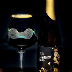 Lasting Brass - Old Leather Man - imperial stout aged in Buffalo Trace bourbon barrels featuring Waterbury's mysterious leather man