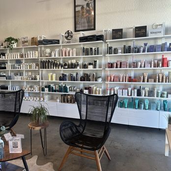 Atelier Beauty Bar - One wall of products in lobby - Hair Salons Near Me - Reno, Nevada Atelier Beauty Bar - One wall of products in lobby - Hair Salons Near Me - Reno, Nevada