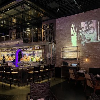 Mott 32 - Bar area. Love the films projected on the wall! - Chinese Near Me - Las Vegas, Nevada Mott 32 - Bar area. Love the films projected on the wall! - Chinese Near Me - Las Vegas, Nevada