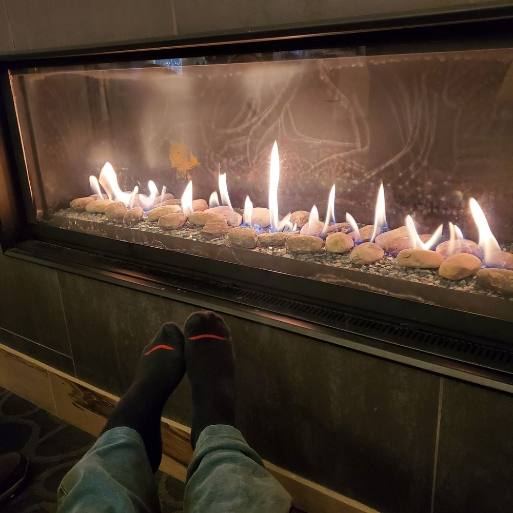 Relax by hot fire in lobby while waiting for room. Relax by hot fire in lobby while waiting for room.