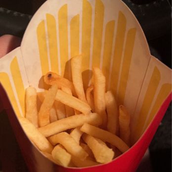 McDonald's - a hand holding a basket of french fries - Fast Food Near Me - Durango, Colorado
