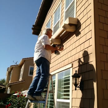 Mr Fix It O C - Michael thinking outside the box to hang some string/globe lights - Handyman Near Me - Orange, California Mr Fix It O C - Michael thinking outside the box to hang some string/globe lights - Handyman Near Me - Orange, California