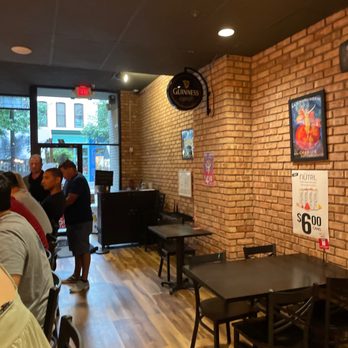 Brick and Porter - people sitting at tables in a restaurant - Pubs Near Me - Grand Rapids, Michigan