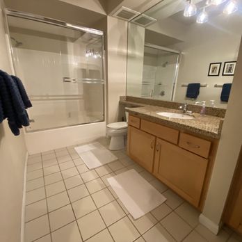Allure Services - a bathroom with a shower, sink, and toilet - Home Cleaning Near Me - San Diego, California Allure Services - a bathroom with a shower, sink, and toilet - Home Cleaning Near Me - San Diego, California