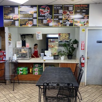 Yareli's Tacos - 1 table inside in front of counter - Mexican Near Me - Vista, California Yareli's Tacos - 1 table inside in front of counter - Mexican Near Me - Vista, California