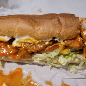 Mike's Subs - Kenmore's Original - a half eaten sub sandwich - Pizza Near Me - Kenmore, New York Mike's Subs - Kenmore's Original - a half eaten sub sandwich - Pizza Near Me - Kenmore, New York
