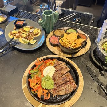 La Popular - Steak fajitas, salsa try, quacamole, al pastor taco plate - Mexican Near Me - Porter Ranch, California La Popular - Steak fajitas, salsa try, quacamole, al pastor taco plate - Mexican Near Me - Porter Ranch, California