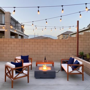 MTS Landscape - a patio with chairs and a fire pit - Landscaping Near Me - Moreno Valley, California