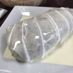 Roasted pork burrito with queso (extra $2) - Be prepared to be embarrassed b/c it's SOO HUGE and smothered