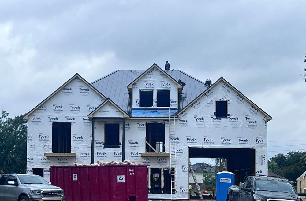 Slide of Rigos Roofing Installers