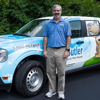 Pet Butler - Pet Butler owner, Coby Hough, standing beside his service truck - Pet Waste Removal Near Me - Silver Spring, Maryland Pet Butler - Pet Butler owner, Coby Hough, standing beside his service truck - Pet Waste Removal Near Me - Silver Spring, Maryland