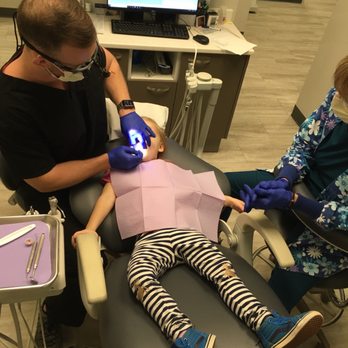 Brushy Creek Dentistry - My little girl being brave in the "up-and-down" chair ;) - Cosmetic Dentists Near Me - Austin, Texas