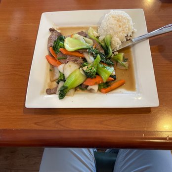 Thai Woodhouse - a plate of food on a table - Thai Near Me - Ormond Beach, Florida