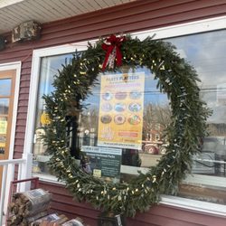 Howard's the Flower Shop - 72 inch Christmas wreaths made by Howards the flower shop in "2022"!