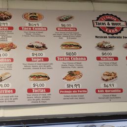 The menu is on the wall The menu is on the wall