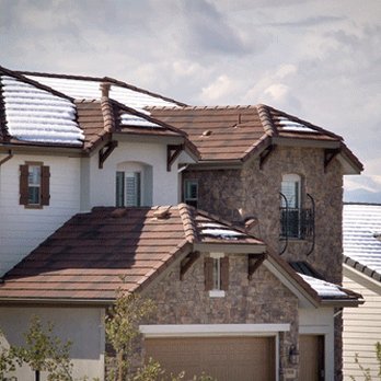 ACT Roofing and Restoration - a house with snow on the roof - Roofing Near Me - Edina, Minnesota ACT Roofing and Restoration - a house with snow on the roof - Roofing Near Me - Edina, Minnesota
