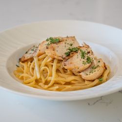 House-made bucatini pasta, grilled chicken breast, Parmigiano Reggiano & butter sauce
