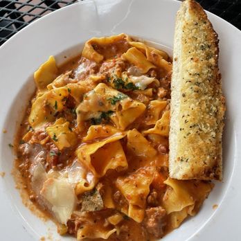 Angelo’s Taverna - Parpardelle bolognese - Italian Near Me - Denver, Colorado Angelo’s Taverna - Parpardelle bolognese - Italian Near Me - Denver, Colorado