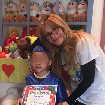 A to Z Fun Care - My son and Ms Katie in the graduation ceremony - Child Care & Day Care Near Me - Potomac, Maryland