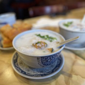 Mike's Noodle House - Rock Cod Congee with pumpkin - Cantonese Near Me - Seattle, Washington Mike's Noodle House - Rock Cod Congee with pumpkin - Cantonese Near Me - Seattle, Washington