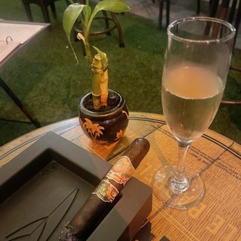 RM 38 - Veuve Clicquot and My Father cigar - Speakeasies Near Me - Honolulu, Hawaii