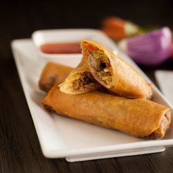 Catering With Her - Hmong Egg Rolls: Meat mixed with vegetables and bean tread noodles wrapped in a thin wheat flour pastry.