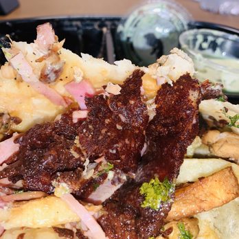 Lucha Libre - Burnt Crispy Cheese clumped in one section of the burrito - Mexican Near Me - San Diego, California