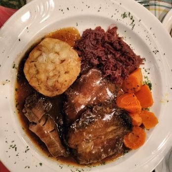 Schmankerl Stube - Sauerbraten with red cabbage, carrots, and a dumpling. - German Near Me - Hagerstown, Maryland Schmankerl Stube - Sauerbraten with red cabbage, carrots, and a dumpling. - German Near Me - Hagerstown, Maryland