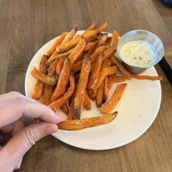 Flower Child - Sweet potato fries. TINY portion ($6) and cold - but the dill ranch sauce was yummy. - Salad Near Me - Riverton, Utah Flower Child - Sweet potato fries. TINY portion ($6) and cold - but the dill ranch sauce was yummy. - Salad Near Me - Riverton, Utah