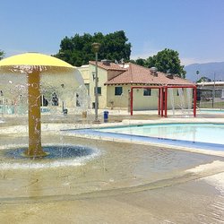 Perris Hill Water Park - The children's wading pool at Perris Hill Park Swim Center and Water Park is surrounded by fun water features.