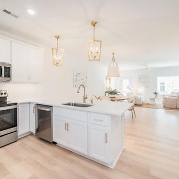 147 Percent Properties - Kitchen, dining area and living room - Condominiums Near Me 147 Percent Properties - Kitchen, dining area and living room - Condominiums Near Me