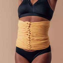 The Twisted Willow Spa - Post partum belly binding. Benefits: relieve pain and soreness, help muscles heal, lowers swelling, and helps organs readjust back