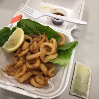 Full Moon Sushi - Calamari appetizer $3.50. Small, texture was really hard, very gummy. Sauce packet and plastic fork for reference to size. - Japanese Near Me - San Clemente, California