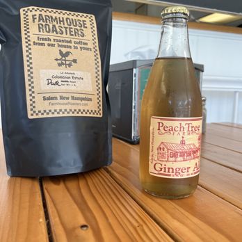 Farmhouse Roasters - a bottle of peach tea next to a bag of ginger tea - Coffee Roasteries Near Me - Salem, New Hampshire Farmhouse Roasters - a bottle of peach tea next to a bag of ginger tea - Coffee Roasteries Near Me - Salem, New Hampshire