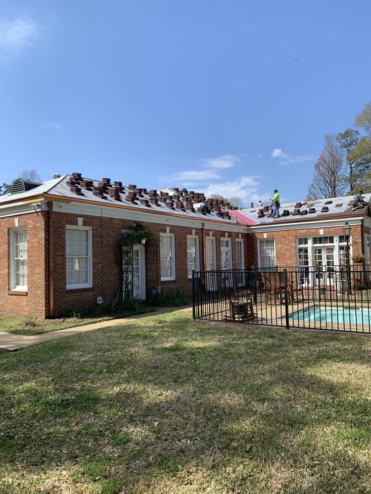 Slide of All Trades Construction