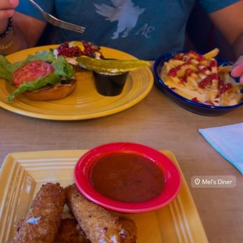 Mel's Diner - Bacon Me'ls Classic Cheese Burg and motzarella sticks - Diners Near Me - Fort Myers, Florida Mel's Diner - Bacon Me'ls Classic Cheese Burg and motzarella sticks - Diners Near Me - Fort Myers, Florida