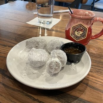 Another Broken Egg Cafe - FREEEEEEEEEEE 1/2 order of 1/2 Order of Biscuit Beignets with a titillating Honey Marmalade because it was our very first visit. - American Near Me - Gilbert, Arizona