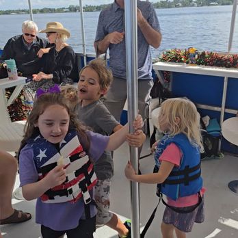 Off the Leash Charters - Kids love dancing around the pole. - Boat Charters Near Me - Cape Coral, Florida Off the Leash Charters - Kids love dancing around the pole. - Boat Charters Near Me - Cape Coral, Florida