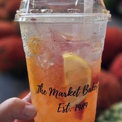 The Market Bakery - The delicious OrangeAde (with beautiful mums in the back)