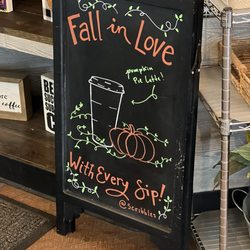 Scribbles Coffee - A signed by the cash register.