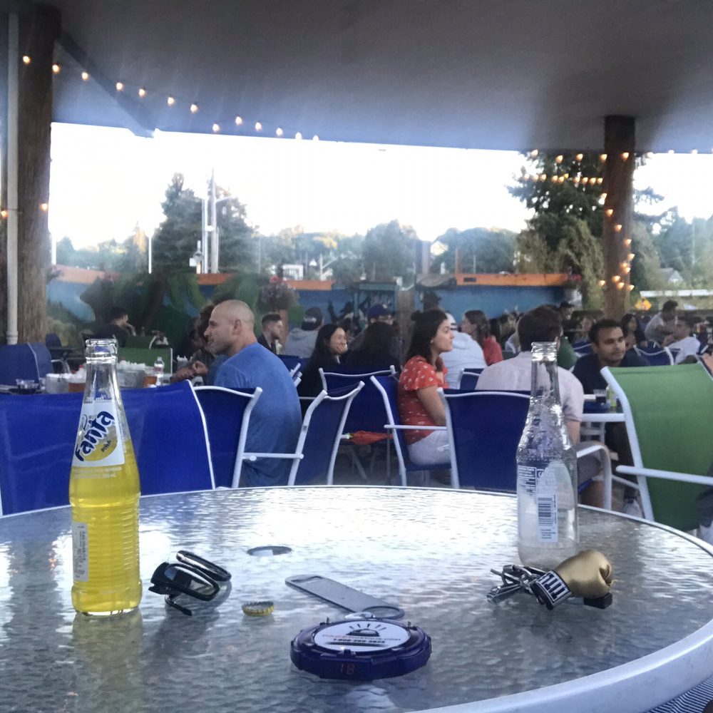 Bongos - outside seating (sand below your feet) - Cuban Near Me - Seattle, Washington Bongos - outside seating (sand below your feet) - Cuban Near Me - Seattle, Washington