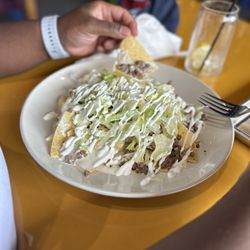 Lolita’s Bar & Grill In Lawrenceville - Supreme Nachos with beef and no tomatoes