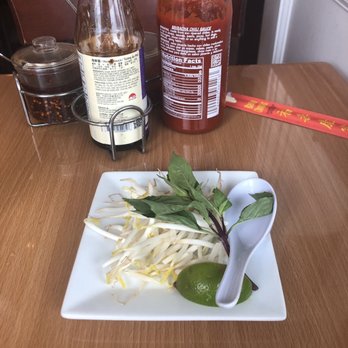 Origin Thai Bistro - Garnishes for Pho - Thai Basil, Sprouts, Lime, Chili Oil, Sriracha, and Hoisin Sauce - Thai Near Me - Tewksbury, Massachusetts Origin Thai Bistro - Garnishes for Pho - Thai Basil, Sprouts, Lime, Chili Oil, Sriracha, and Hoisin Sauce - Thai Near Me - Tewksbury, Massachusetts