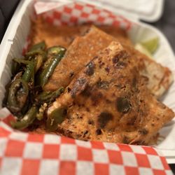 La Fiesta Meat Market & Deli - Quesabirria quesadilla (so good)!! And those jalapeños were delicious and hot!!