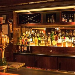 Poe's Magic Theatre - The fully stocked LB Tavern has great food and drinks for guests!