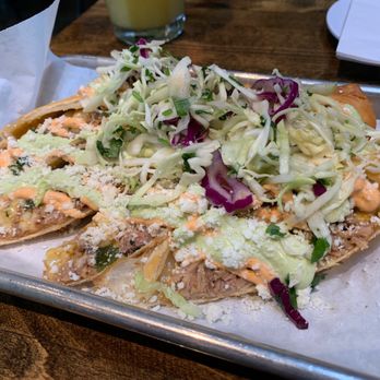 Sunset Cantina - Carnitas Flautas - Flour Tortilla, Carnitas, Corn, Jack Cheese, Poblanos, Cilantro-Lime Slaw, Chipotle & Avocado Crema, and Cotija - Cocktail Bars Near Me - San Francisco, California