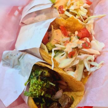 The Taco Stand - Left carne asada & 2 pescado fish - all the tacos were large, had wonderful contrast of flavors, fresh veg, and packed w chunks of meat! - Mexican Near Me - Miami, Florida