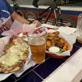 Uncle Sam's - Special grinder with grilled meat. Honey hot wings and lagunitas. - Pizza Near Me - Phoenix, Arizona